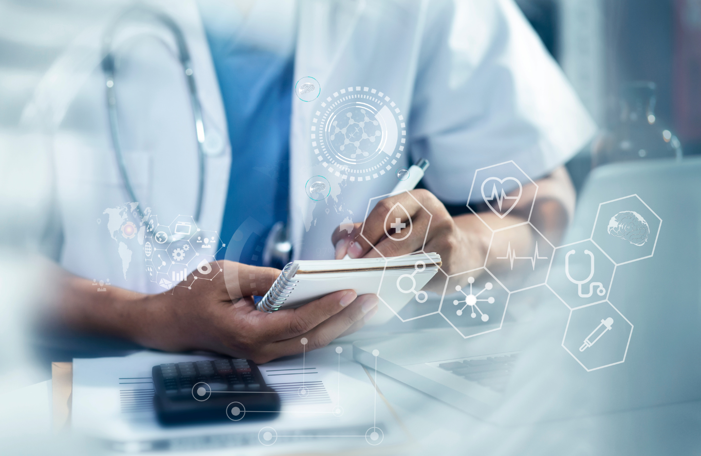 Health care professional writing on a pad of paper